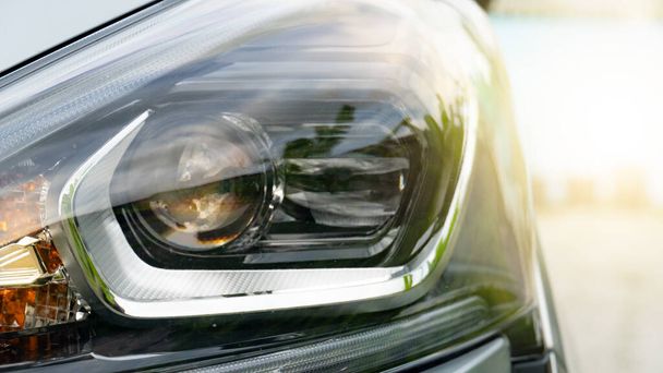 Close up car front lamp. with blurred and light from back side. - Zdjęcie, obraz
