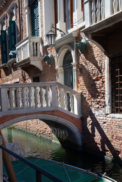 Venice - ancient beautiful romantic and tourist attraction italian city with canals, bridges and old buildings - Foto, Imagen