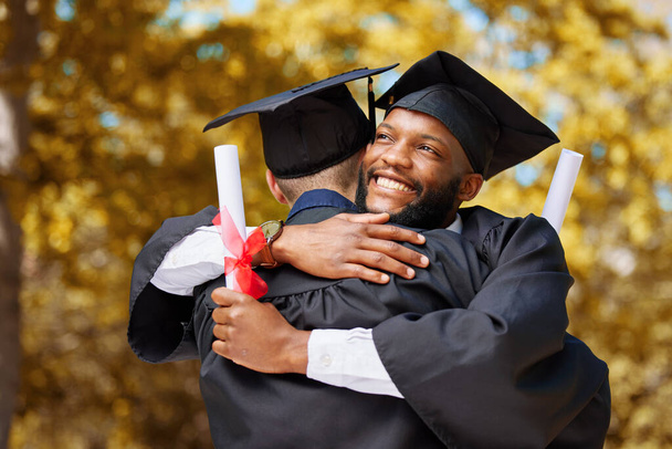 Graduation, happy black man and hug of friends to celebrate education achievement, success and goals outdoor. Male university students embrace for congratulations, graduate support or dream of future. - Фото, изображение