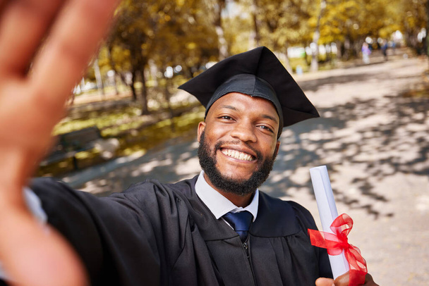 Black man, graduation selfie and diploma for college student, smile and excited for future at campus event. Graduate, education and celebration with certificate, memory or profile picture for success. - Photo, Image
