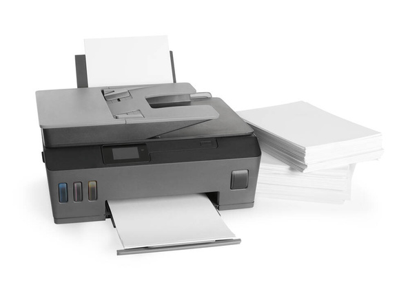 Modern printer and stack of paper on white background - Valokuva, kuva