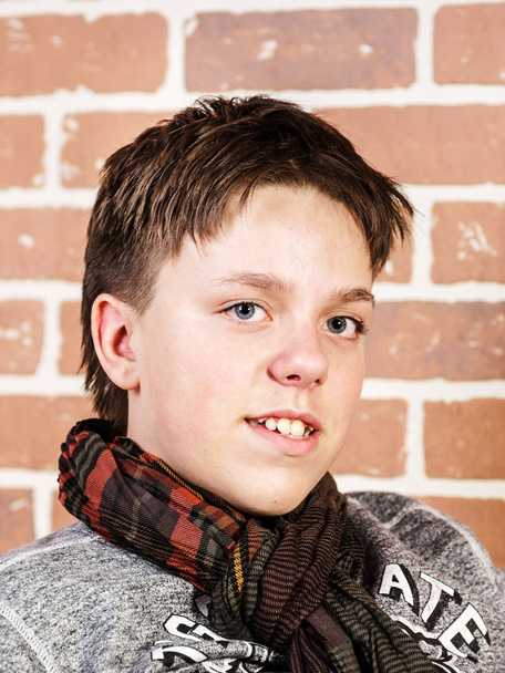 Affective teenage boy portrait in studio - Foto, afbeelding