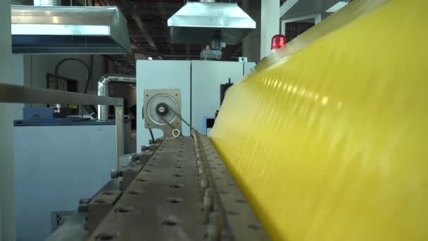 Tape manufacturing plant. Industrial line for the production of plastic packaging film. Factory for the production of packaging materials. - Footage, Video