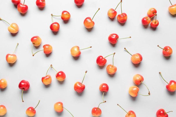 Many sweet cherries on grey background - Foto, Imagem