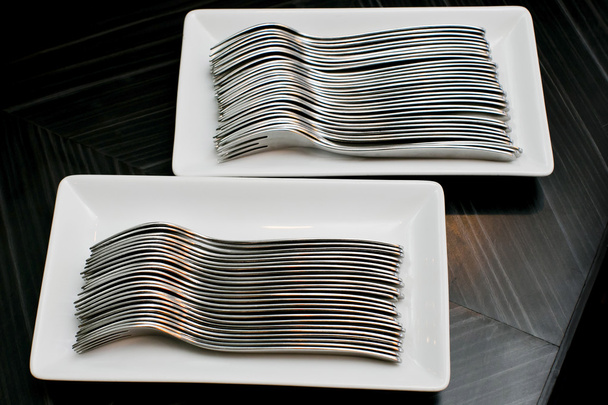 many forks isolated on a white dish - Valokuva, kuva