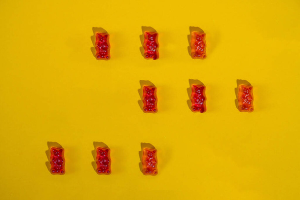 jelly bears candy isolated on a yellow background. Jelly Bean. - Foto, imagen