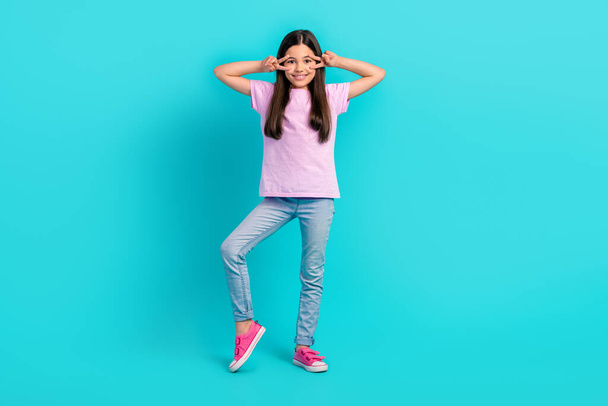 Photo of good mood charming small kid wear pink t-shirt showing two v-signs cover eyes isolated turquoise color background. - Φωτογραφία, εικόνα