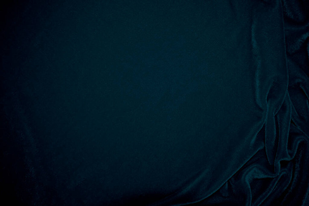 Texture de tissu de velours bleu utilisé comme fond. Peacock couleur panne tissu fond de matériau textile doux et lisse. velours broyé .luxury ton marine pour la soie. - Photo, image