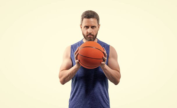 sport man basketball player in studio. photo of sport man basketball player with ball. sport man basketball player in sportswear. sport man basketball player isolated on white background. - Fotoğraf, Görsel