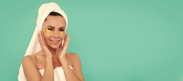 young woman in shower towel with rejuvenate patch. Woman isolated face portrait, banner with copy space - Photo, Image