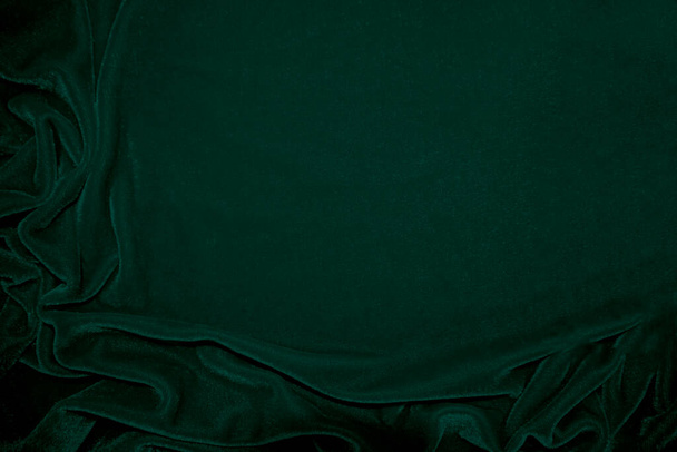 Green velvet fabric texture used as background. Emerald color panne fabric background of soft and smooth textile material. crushed velvet .luxury emerald tone for silk.	 - Photo, image