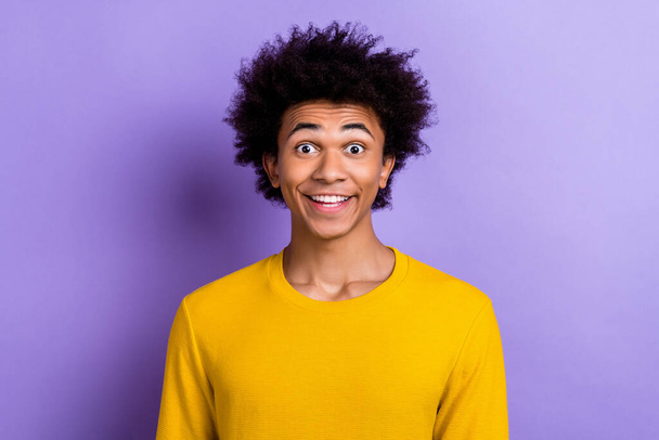 Portrait of cheerful astonished person beaming smile raise eyebrows cant unbelievable isolated on purple color background. - Foto, Imagen