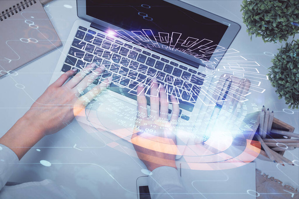 Double exposure of woman hands working on computer and data theme hologram drawing. Top View. Technology concept. - Φωτογραφία, εικόνα