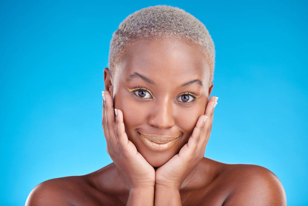 Face, makeup portrait and happy black woman with aesthetic eyeliner, studio cosmetics and luxury skincare glow. Facial beauty confidence, wellness smile and female African model on blue background - Фото, зображення
