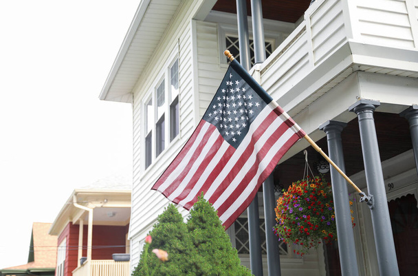 american flag on a wooden porch - Photo, image