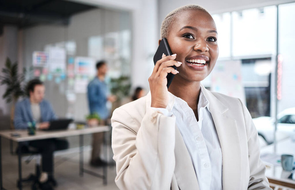 Excited, phone call and black woman in office for communication, conversation or chat. Smartphone, happy and business professional listening, talking or discussion with contact in coworking workplace. - Fotografie, Obrázek
