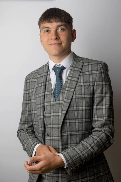 Young entrepreneur wearing a suit, tie and waistcoat - Фото, изображение