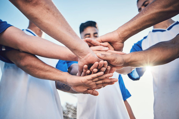 Soccer, hands together and teamwork, support and sports for training at stadium. Collaboration, group huddle and football players with motivation for exercise, workout goal or success in competition. - Φωτογραφία, εικόνα