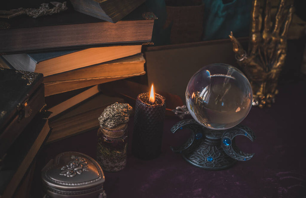 Magical scene, esoteric and wicca concept, fortune telling, witch stuff on a table - Фото, изображение