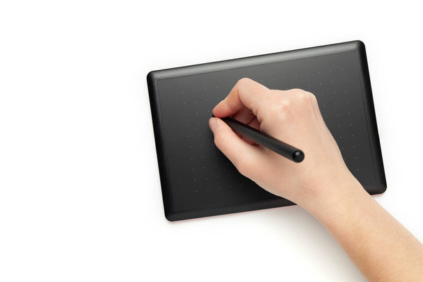 Graphic tablet for drawing and designer hand on white background. Creative art, sketch. - Zdjęcie, obraz