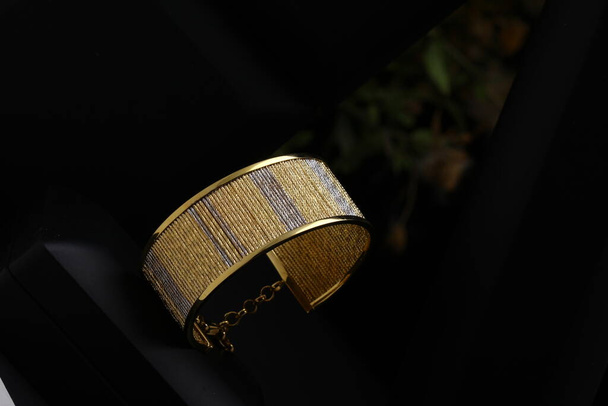 Jewelry box with stylish golden bijouterie, closeup view - Fotografie, Obrázek