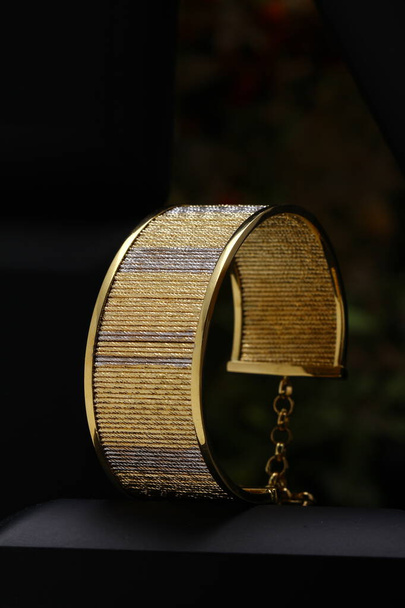 Jewelry box with stylish golden bijouterie, closeup view - Fotografie, Obrázek