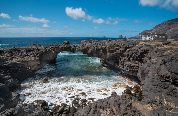 rocky beach with a natural arch in Las Puntas. El Hierro island. Canary Islands - Foto, Imagem