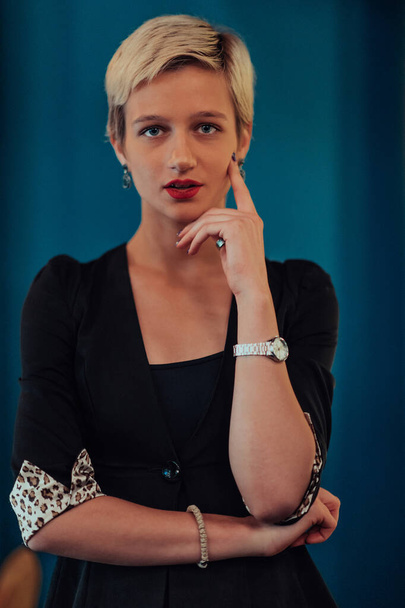 Blonde business woman, successful confidence on modern blue mat background. Selective focus.  - Fotografie, Obrázek