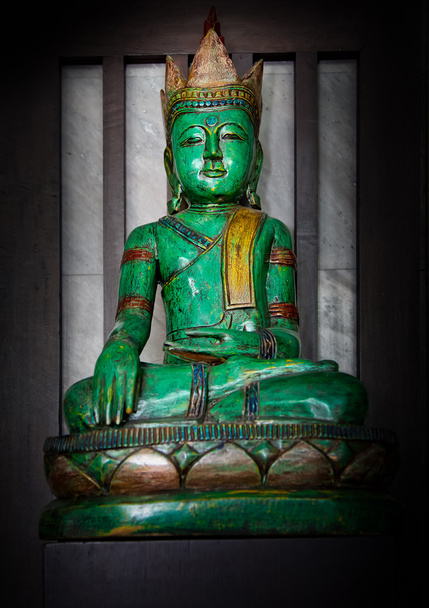 Green wood carving Buddha image - Photo, Image