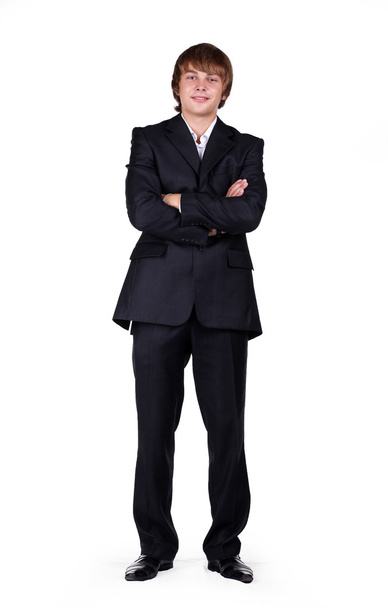Portrait of a young businessman posing in studio - Фото, зображення