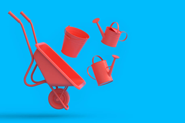 Garden wheelbarrow with garden tools like water can, rake and bucket on monochrome background. 3d render concept of horticulture and farming supplies - Фото, зображення