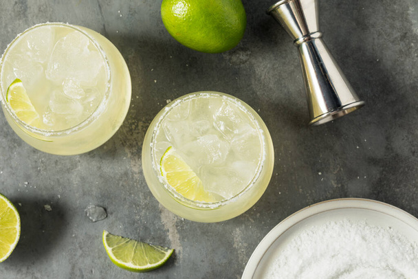 Boozy Refreshing Mezcal Margarita with Lime and Salt - Photo, Image