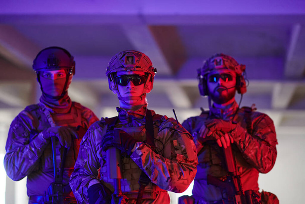 soldier squad team walking in urban environment colored lightis.  - Foto, Imagem