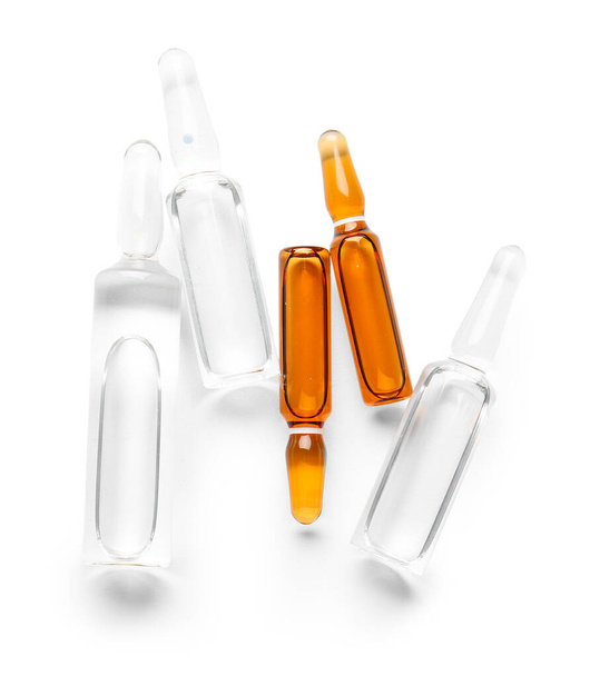 Glass medical ampules on white background - Фото, зображення