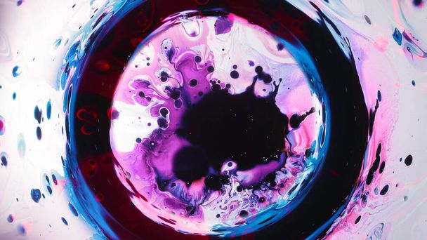 Paint swirl. Interstellar cloud. Pink blue red liquid splash in black circle frame ink floating abstract illustration on white background. - Fotografie, Obrázek