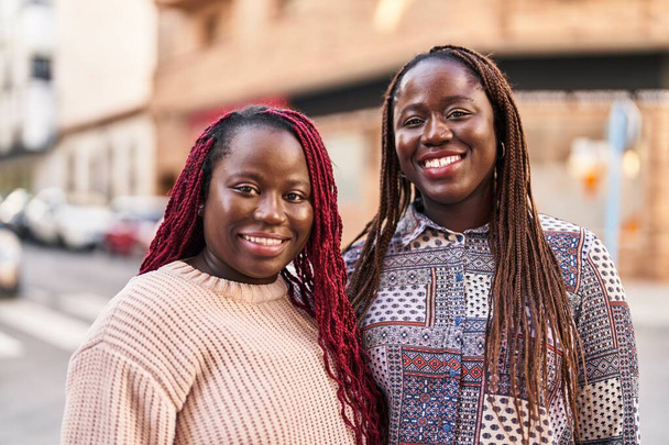 African american women friends smiling confident standing together at street - Φωτογραφία, εικόνα