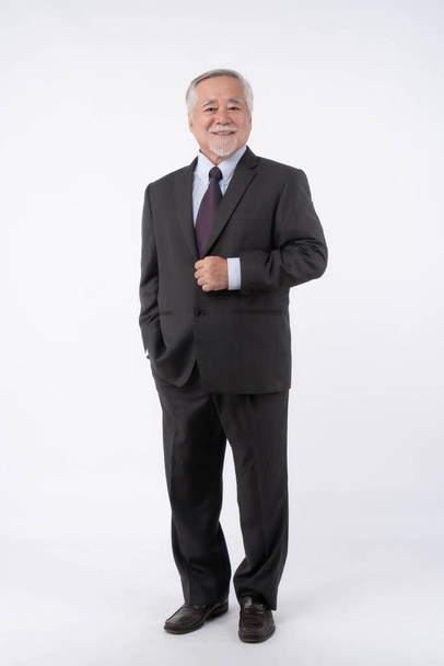 Full length portrait of a business man senior management , Asian senior man , old man with suit isolated on white background with copy space - lifestyle senior male concept - Foto, Imagen