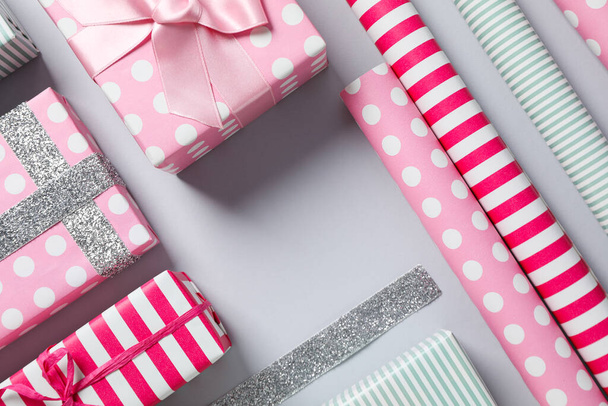 Concept of wrapping gift, composition with wrapping paper - Photo, Image