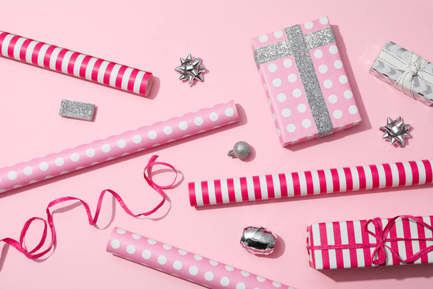 Concept of wrapping gift, composition with wrapping paper - Foto, afbeelding