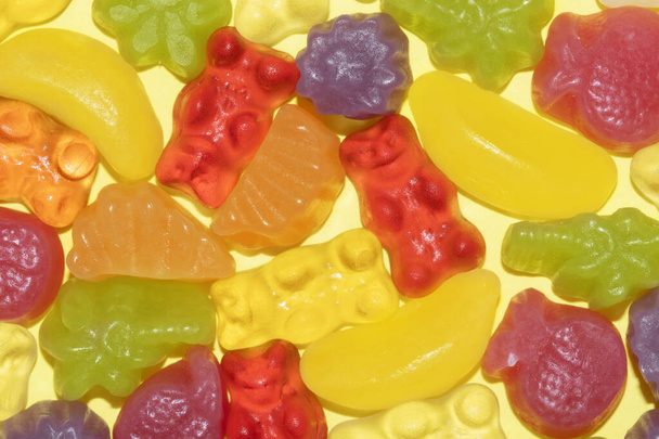 close up of yummy jelly sweats on a yellow background vegan - Фото, зображення