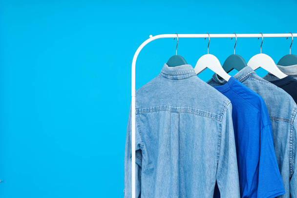 Wardrobe rack with different clothes, concept of different clothes - Foto, Bild