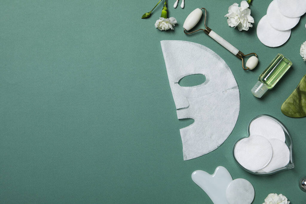 Concept of face and skin care with cosmetic mask - 写真・画像