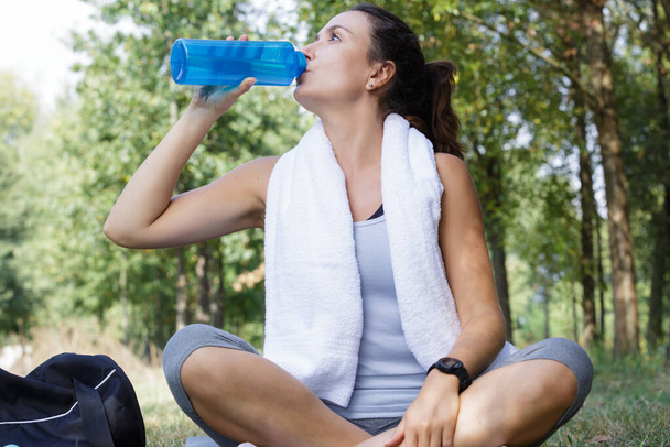 woman drink water from bottle and sport outdoors healthy lifestyle - Foto, Bild