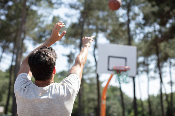 a man doing basketall outdoors - Fotografie, Obrázek