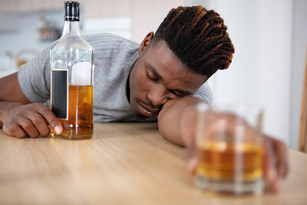 alcoholism alcohol addiction and people concept - 写真・画像
