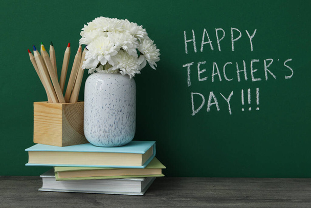 Happy teacher's day greetings, inscription on a green board - Valokuva, kuva