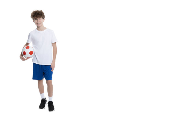 PNG,teenager with a ball, place for text, isolated on white background - Fotografie, Obrázek