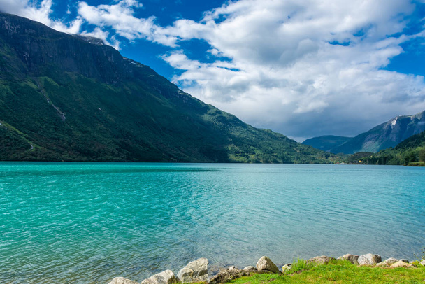 Landscape of the Lovatnet glacial lake with turquoise crystal clear water, Norway - 写真・画像