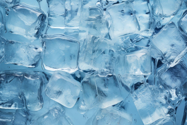 Fresh ice cubes to chill drink. Frozen pure water. Clear ice cubes background. Top view of ice pieces on table. Light blue color. Macro shot - 写真・画像