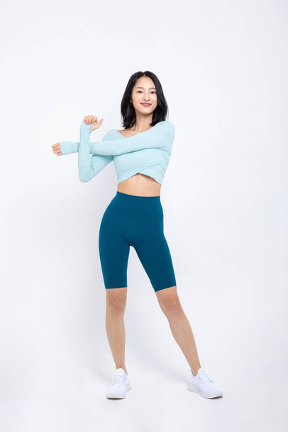 healthy beauty concept photo of korean asian beautiful woman stretching - Photo, image